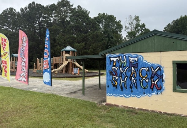 Picture of the Snack Shake with the playground in the background.