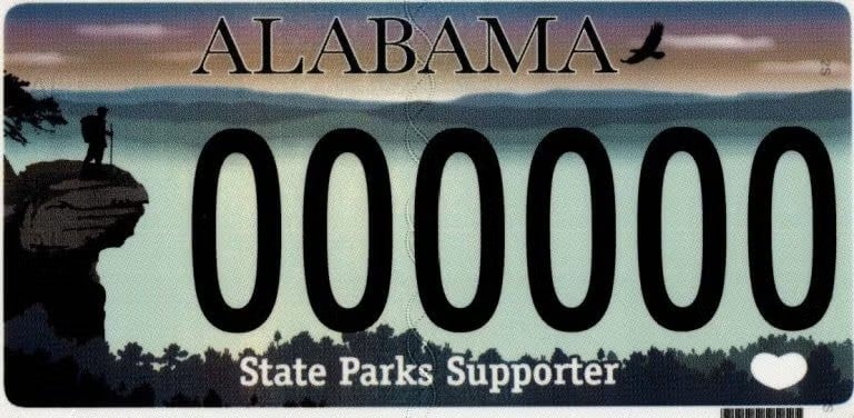 Car tag with 000000 on it.