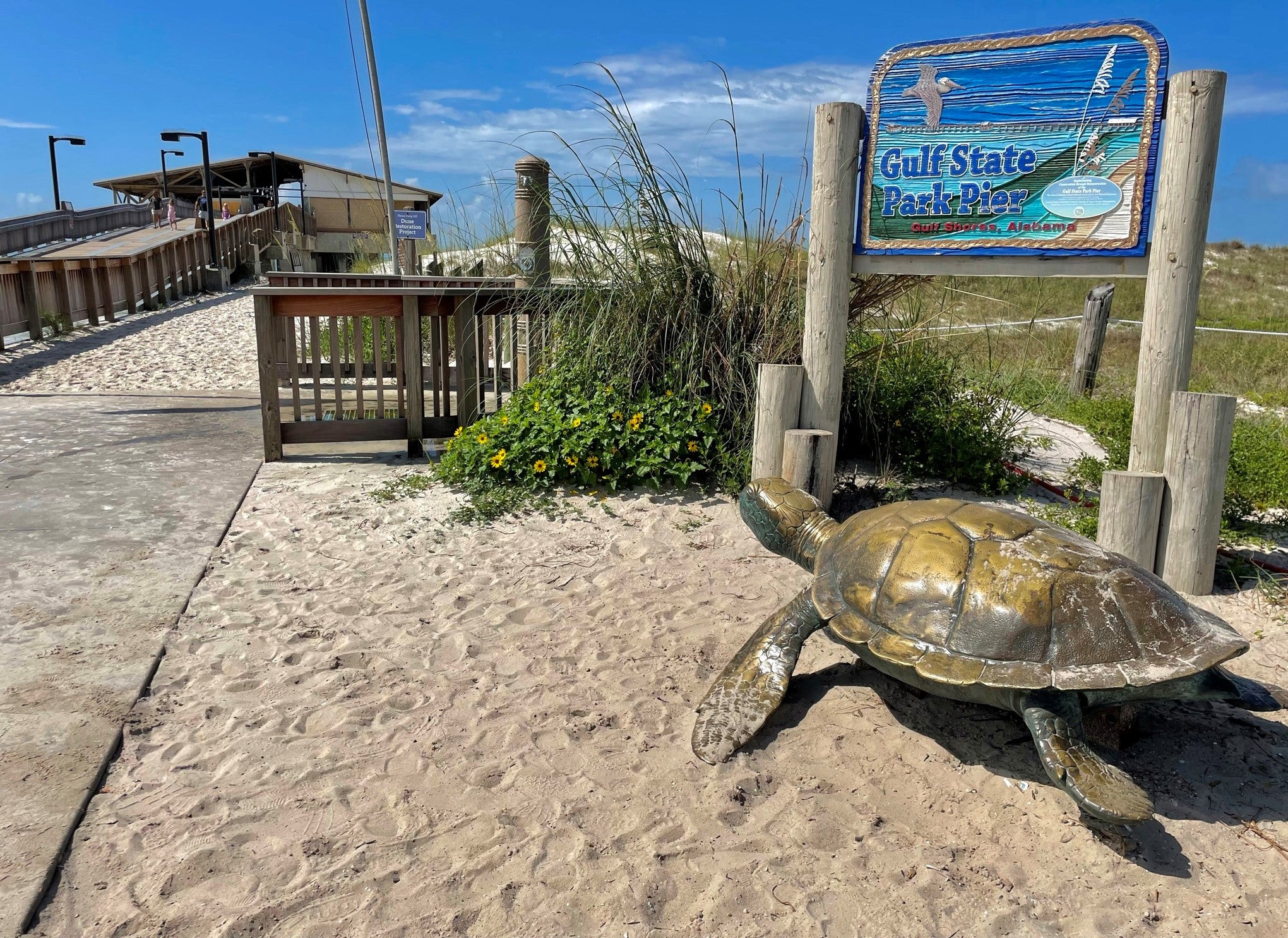 Gulf State Park Pier Entrance With Sign and Sea Turtle Statue