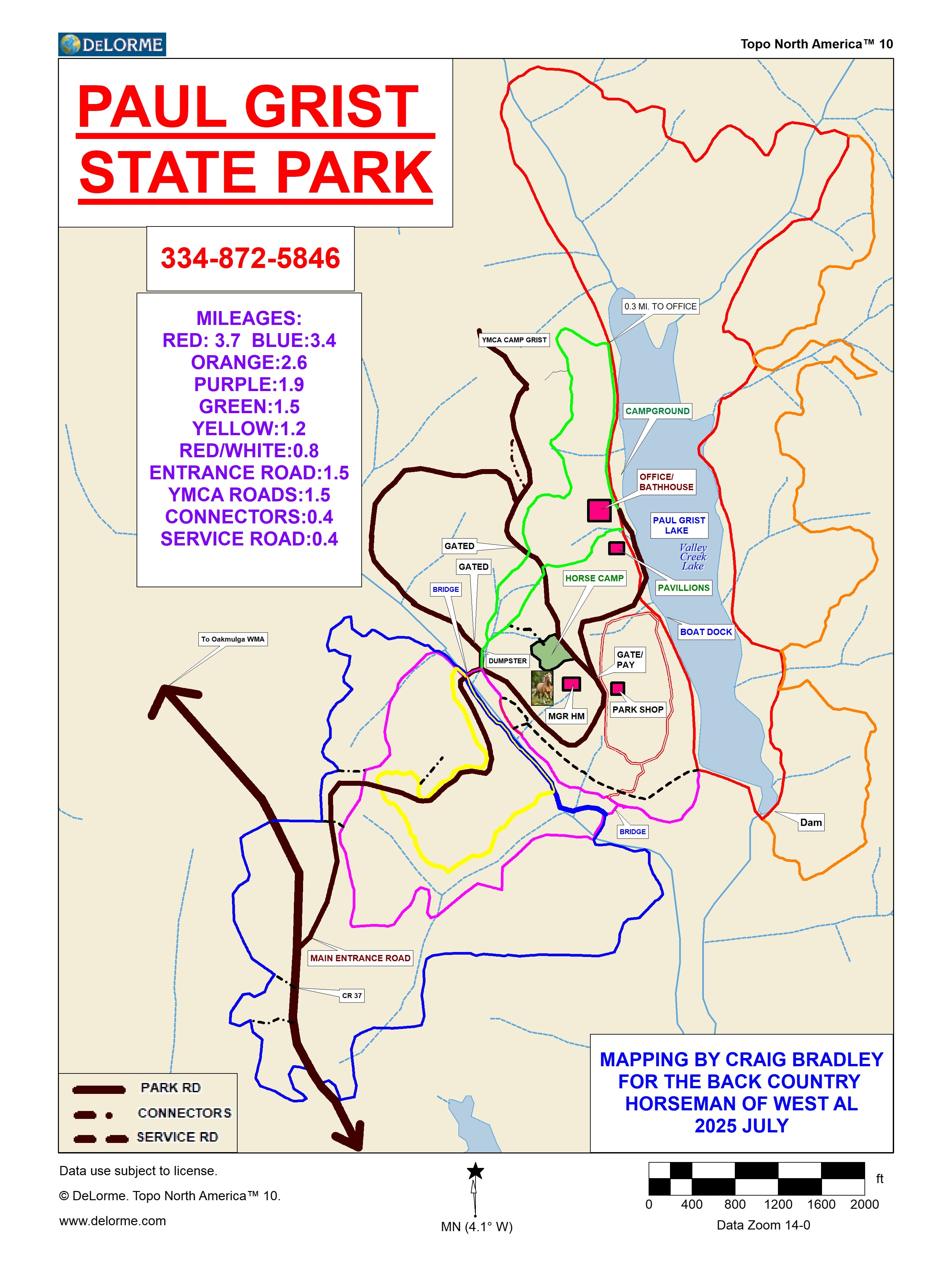 Map of Paul Grist State Park in Alabama showing a network of color-coded trails, park roads, and facilities centered around Paul Grist Lake. The lake runs north–south along the right side of the map, with a dam at the southern end and a boat dock and pavilions along the shoreline.  Trails are marked by color with listed distances: red (3.7 miles), blue (3.4 miles), orange (2.6 miles), purple (1.9 miles), green (1.5 miles), yellow (1.2 miles), and a red/white trail (0.8 miles). Additional routes include entrance road (1.5 miles), YMCA roads (1.5 miles), connectors (0.4 miles), and service roads (0.4 miles). Trails loop and intersect throughout the park, with the largest loops (red and blue) circling outer areas and shorter loops (green, yellow, purple) closer to the center.  Key features labeled near the lake include campground, office/bathhouse, park shop, horse camp, YMCA Camp Grist, pavilions, and parking areas. Bridges, gated access points, a dumpster, and a manager’s home are also marked. A main entrance road enters from the south, connecting to internal park roads. An arrow on the left indicates direction to Oakmulgee Wildlife Management Area.  A legend identifies road types (park road, connectors, service road), and a scale bar shows distances up to 2,000 feet. The map includes a contact phone number and notes it was mapped by Craig Bradley for the Back Country Horsemen of West Alabama, July 2025.