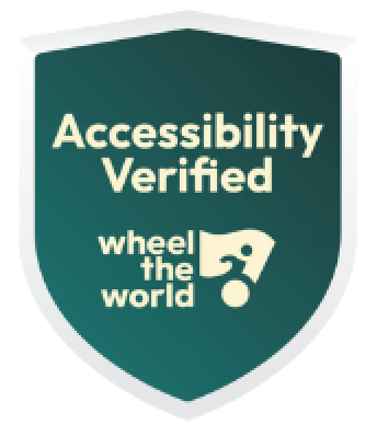 Green Accessibility Verified Wheel of the World Logo. 
