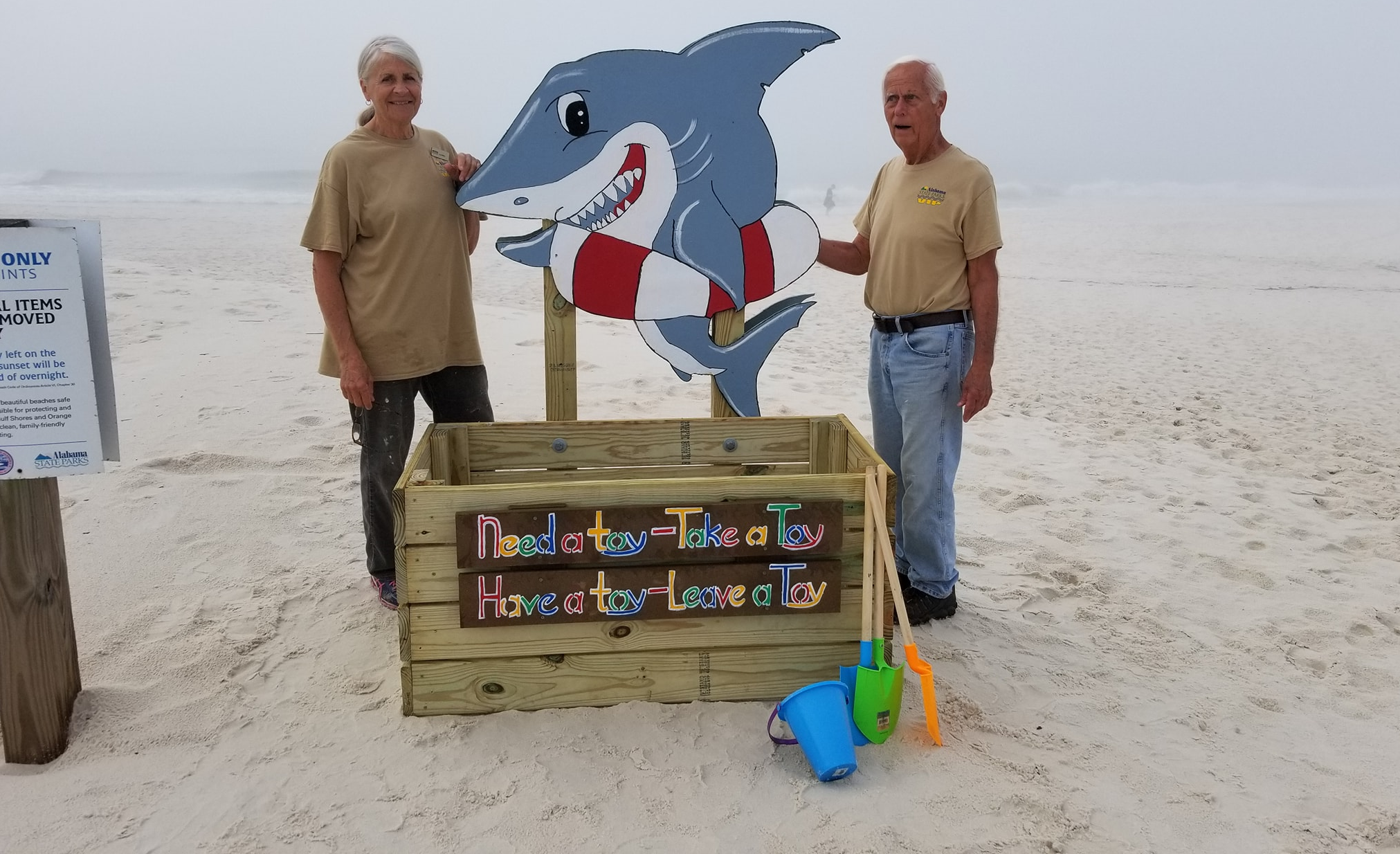 Volunteer Camp Hosts Finished Project of Beach Toy Bins