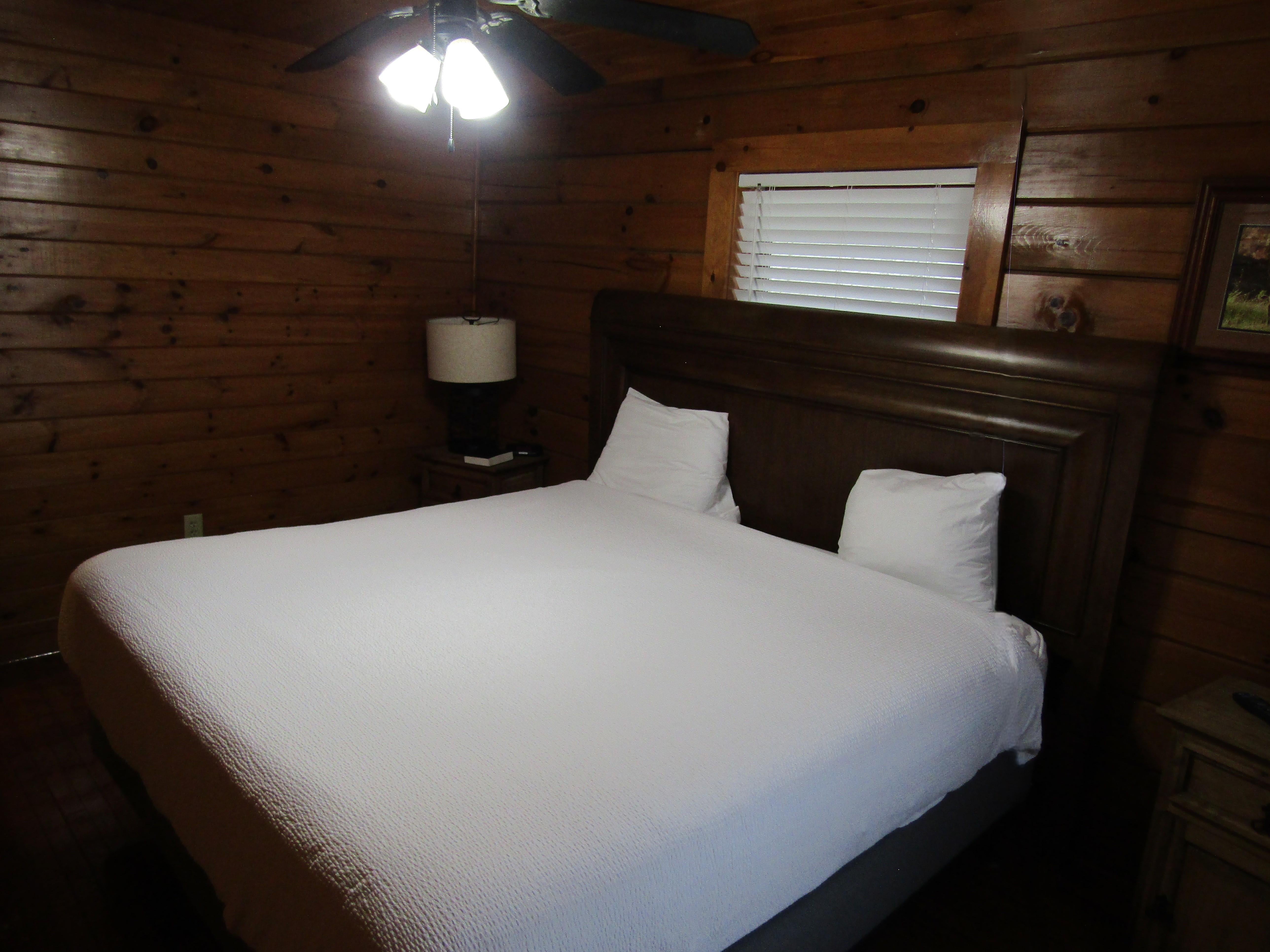 king size bed with white linens